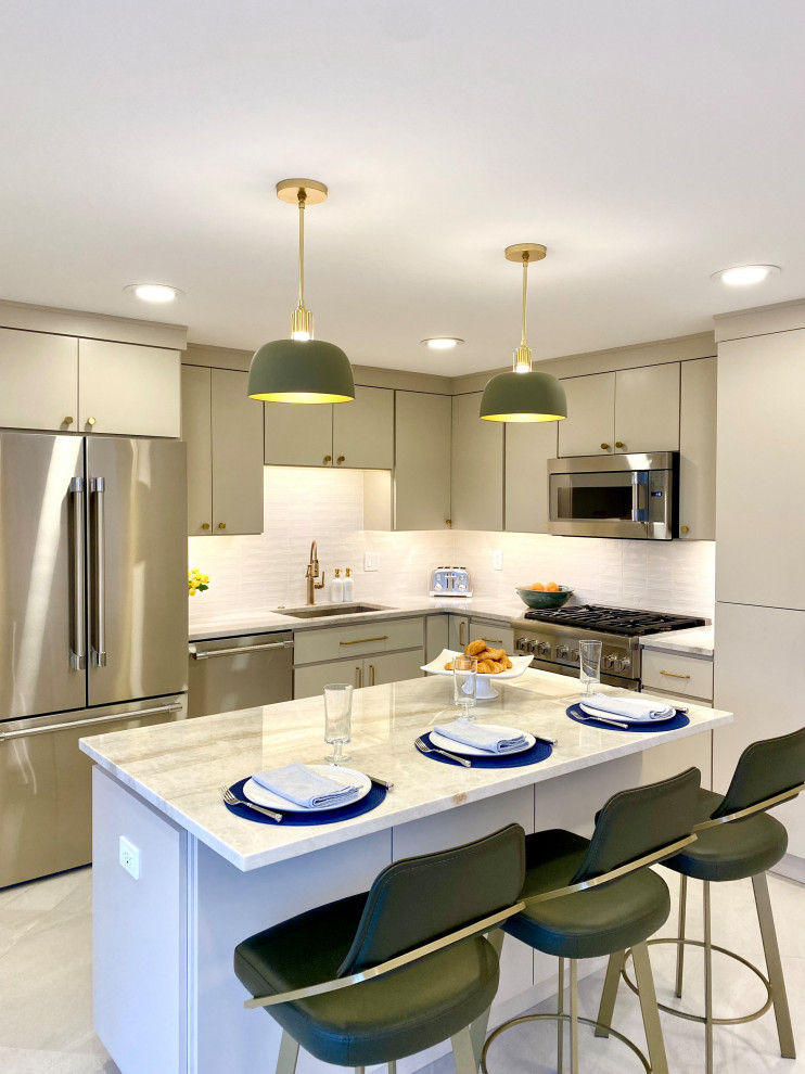 Large minimalist l-shaped porcelain tile and beige floor kitchen pantry photo with a single-bowl sink, flat-panel cabinets, beige cabinets, quartzite countertops, white backsplash, porcelain backsplash, stainless steel appliances, an island and beige countertops