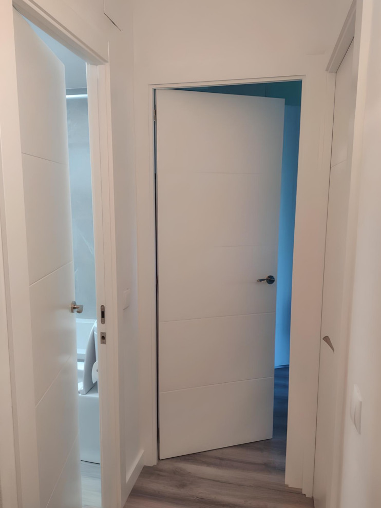 Reforma integral: Carpintería, instalación de parqué y cambio de puertas