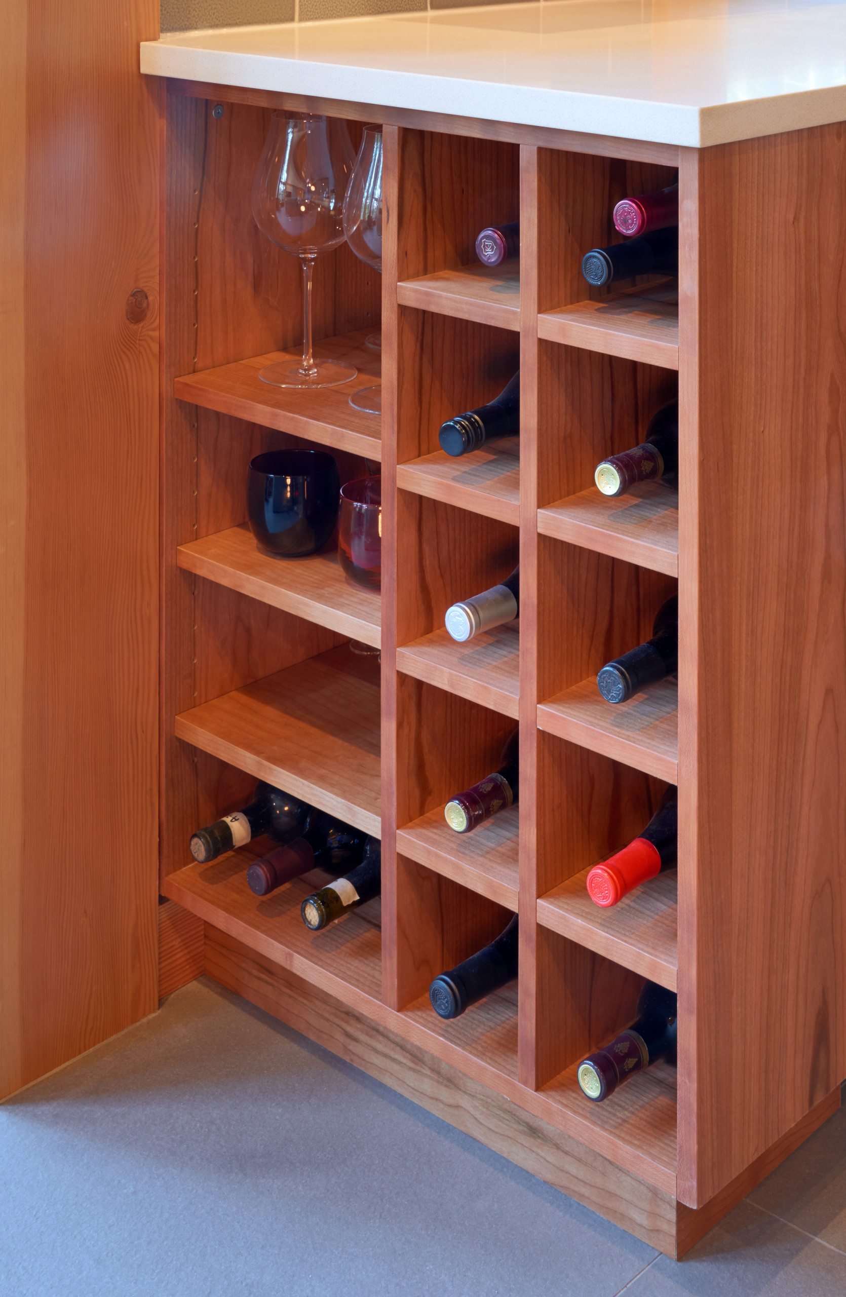 The home features multiple built-ins, including a kitchen wine rack.