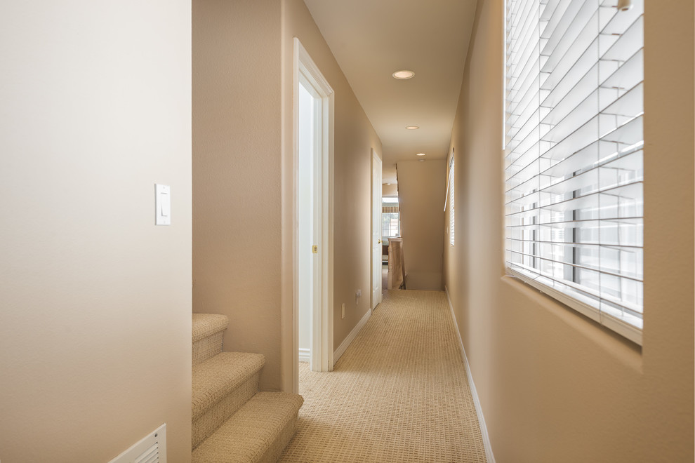 This is an example of a beach style hallway in Orange County.