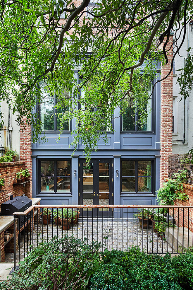 This is an example of a transitional blue exterior in New York.