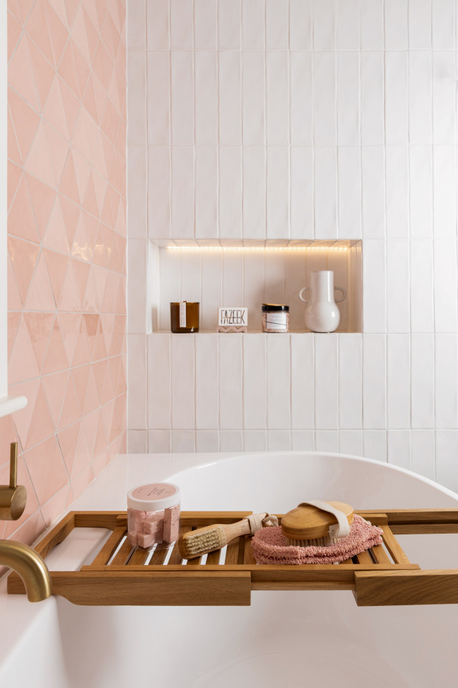 Large contemporary master bathroom in Melbourne with furniture-like cabinets, medium wood cabinets, a freestanding tub, an alcove shower, a one-piece toilet, white tile, ceramic tile, white walls, porcelain floors, a vessel sink, engineered quartz benchtops, multi-coloured floor, a hinged shower door, white benchtops, a niche, a single vanity and a floating vanity.