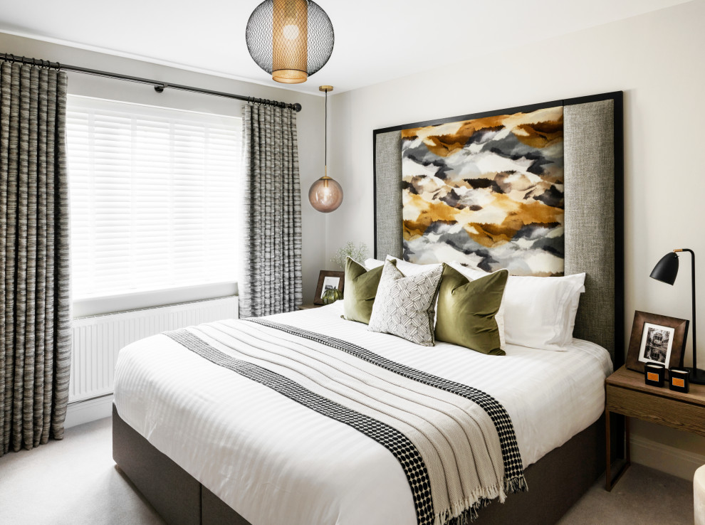 This is an example of a transitional bedroom in Surrey.