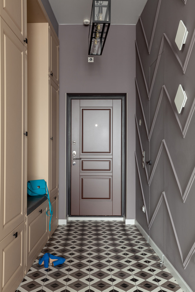 Design ideas for a mid-sized transitional front door in Moscow with red walls, ceramic floors, a single front door, a brown front door and grey floor.