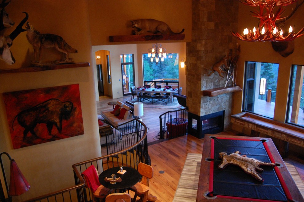 Example of a transitional home design design in Albuquerque