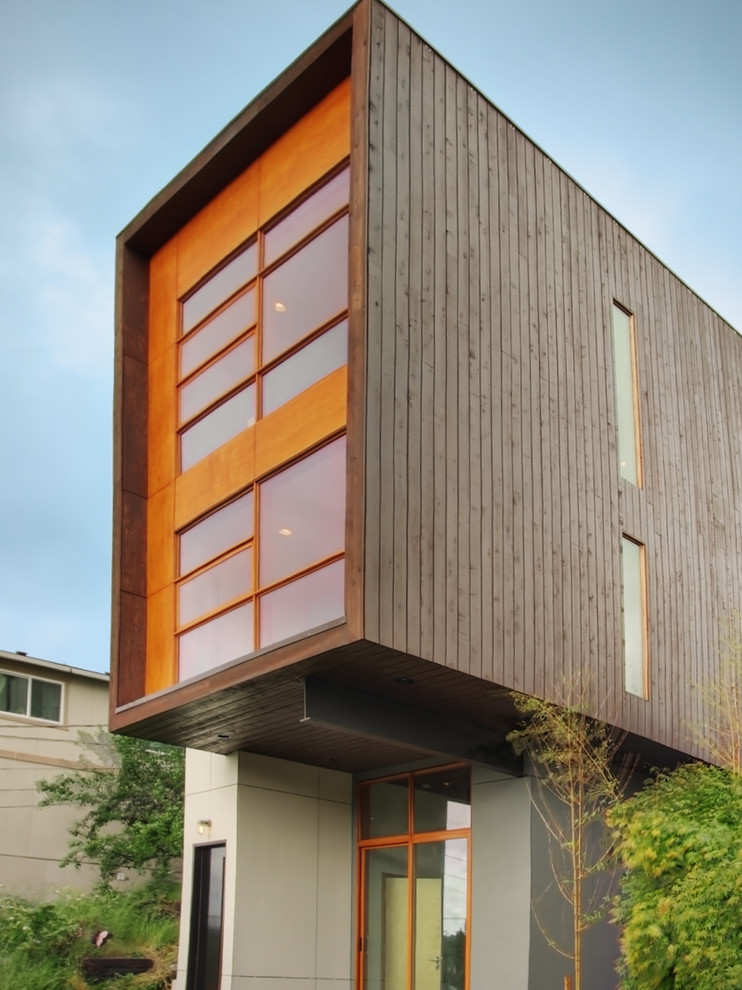Inspiration for a contemporary exterior in Seattle with wood siding.