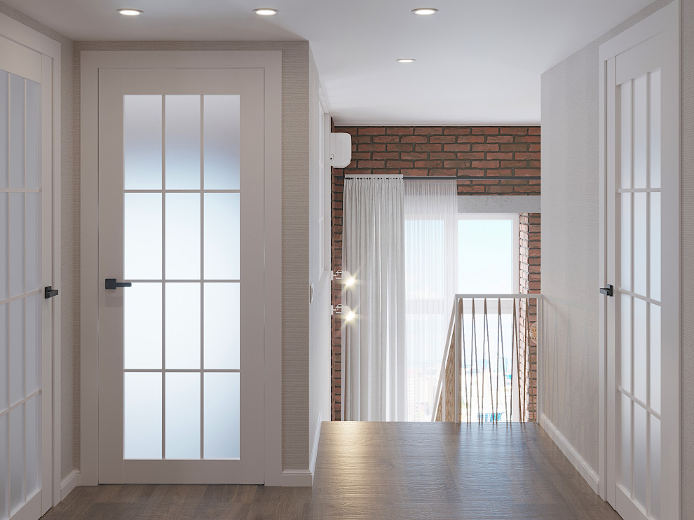 Idee per un piccolo ingresso o corridoio minimalista con pareti beige, pavimento in vinile, pavimento marrone e carta da parati