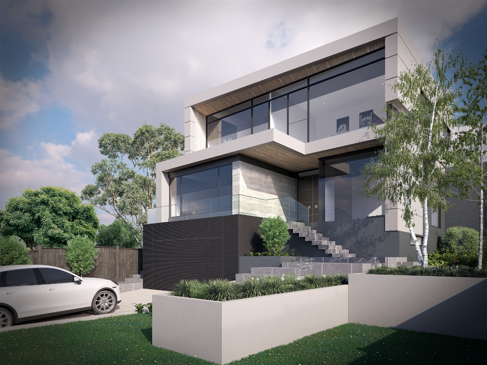 Design ideas for an expansive modern three-storey grey exterior in Melbourne with stone veneer.