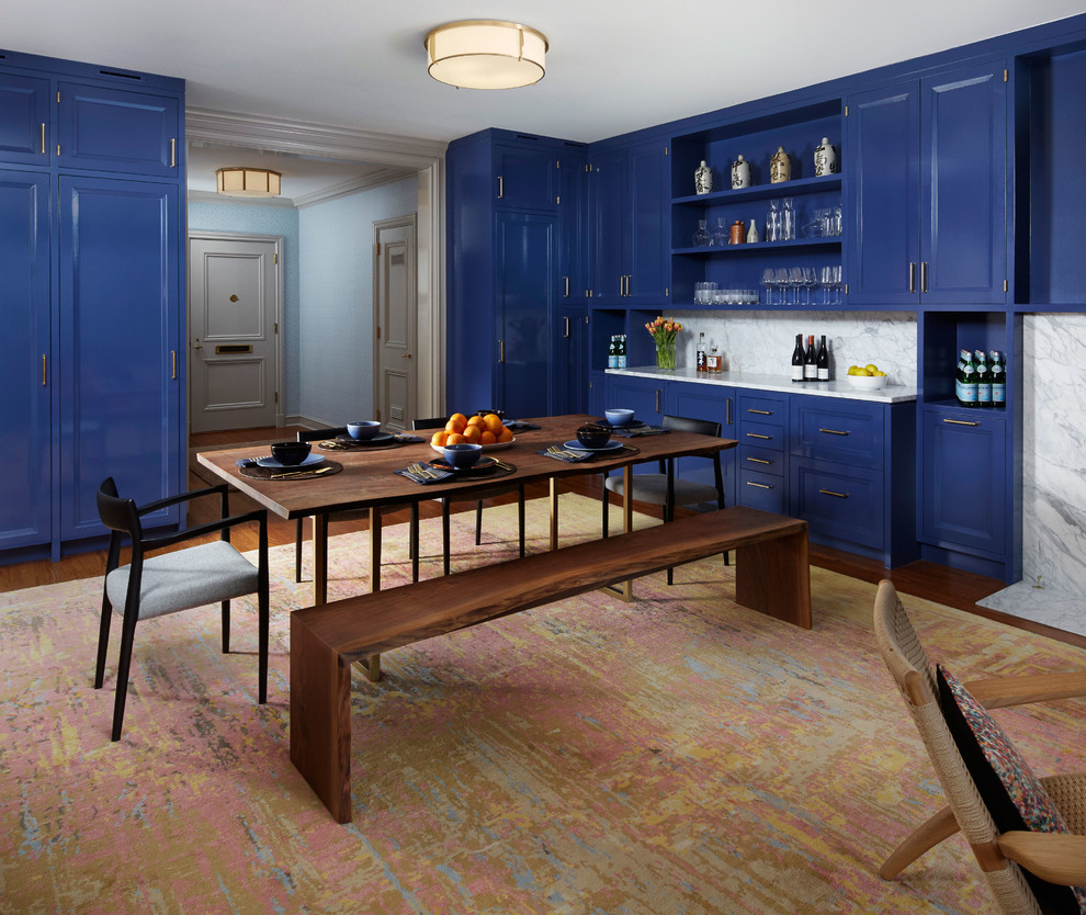 This is an example of a small transitional open plan dining in Chicago.