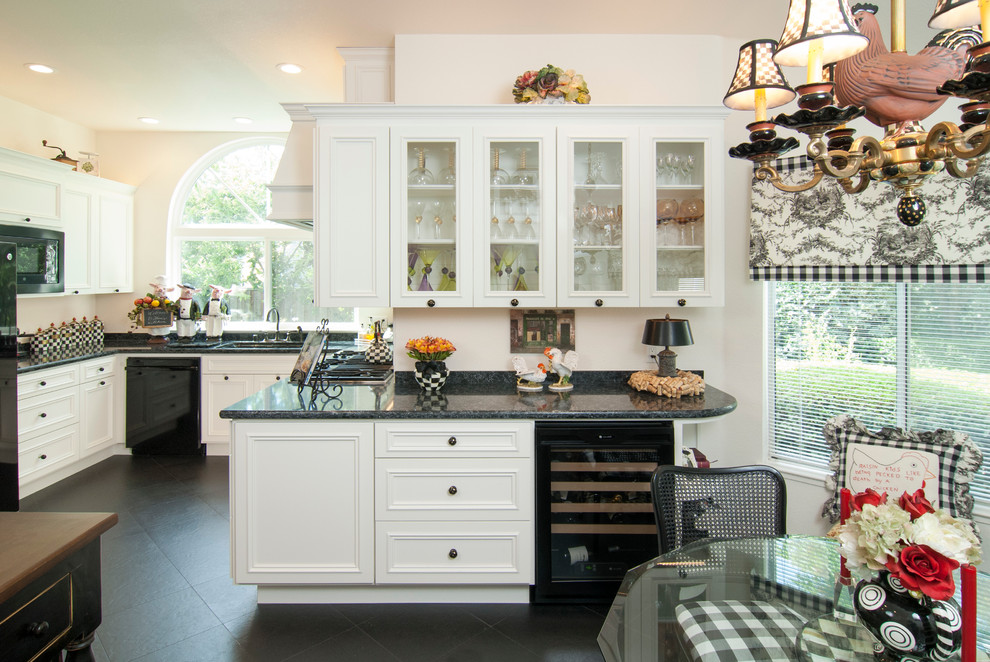 Inspiration for a mid-sized contemporary u-shaped eat-in kitchen in San Francisco with an undermount sink, recessed-panel cabinets, white cabinets, granite benchtops, white splashback, ceramic splashback, black appliances and vinyl floors.