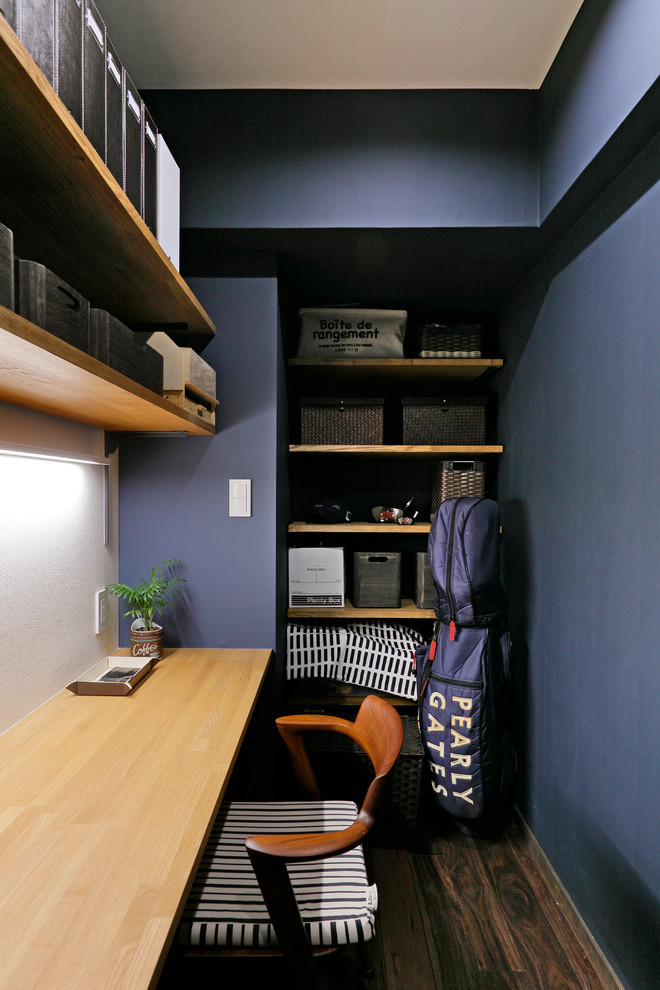 This is an example of a scandinavian home office in Other.
