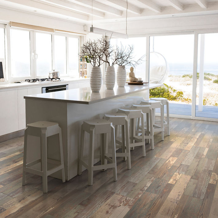 Kitchen - coastal laminate floor and brown floor kitchen idea
