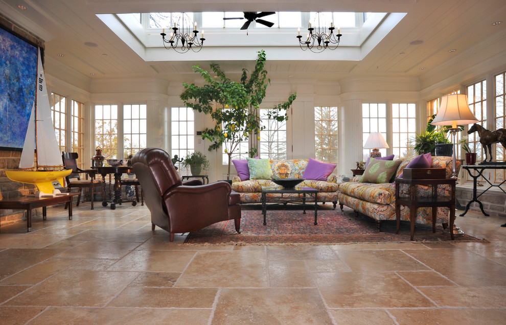 Large traditional sunroom in Cincinnati with ceramic floors, no fireplace and a skylight.