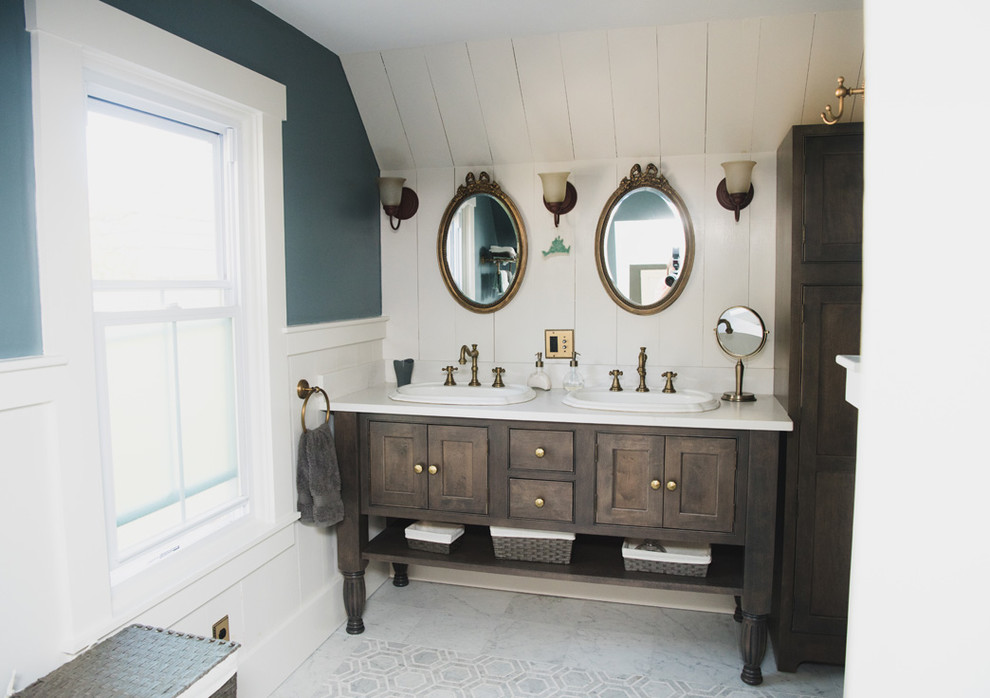 Inspiration for a mid-sized traditional master bathroom in Boston with beaded inset cabinets, brown cabinets, an alcove shower, a two-piece toilet, grey walls, marble floors, an undermount sink, engineered quartz benchtops, green floor and a hinged shower door.