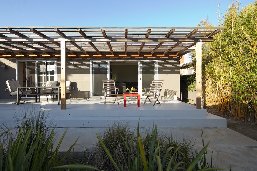 Design ideas for a contemporary deck in Los Angeles with a pergola.