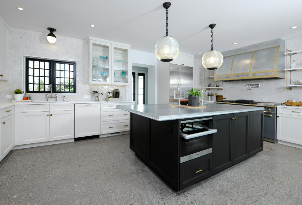 This is an example of a mid-sized industrial u-shaped separate kitchen in New York with flat-panel cabinets, black cabinets, zinc benchtops, with island and white benchtop.