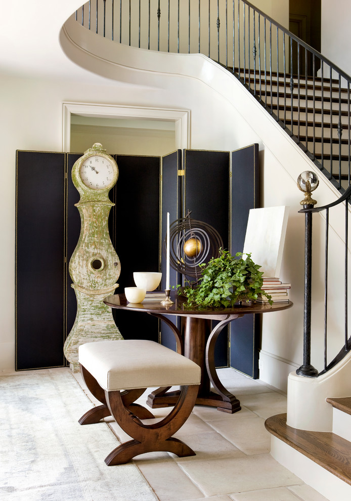 This is an example of a transitional foyer in Atlanta with beige walls.