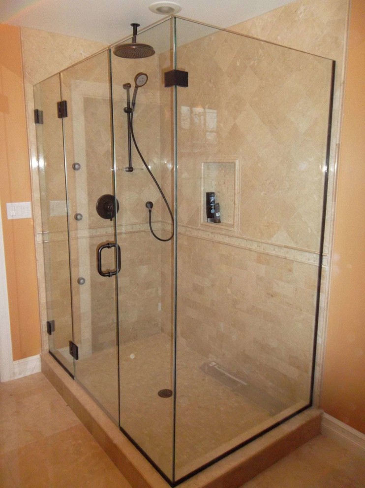 Design ideas for a small contemporary master bathroom in New York with a corner shower and a hinged shower door.
