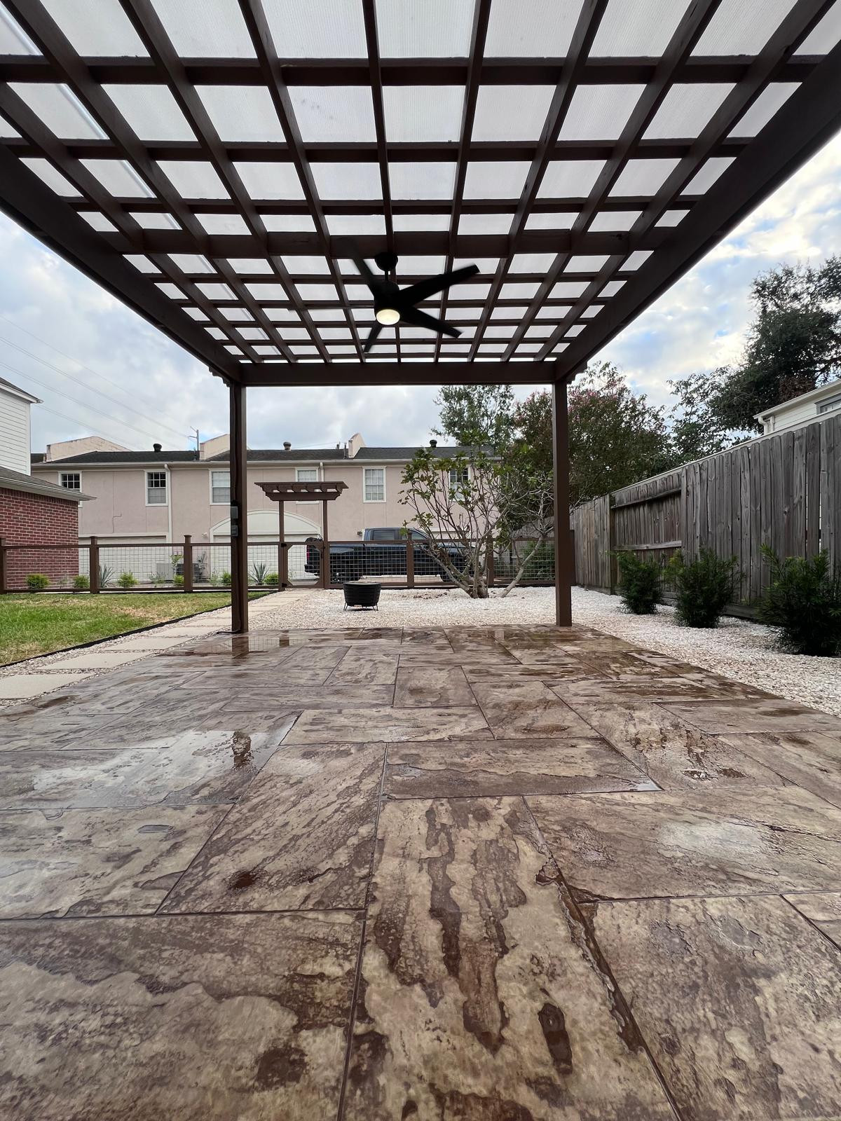 Beautiful stamped concrete patio with Pergola Cover on Haddon st!
