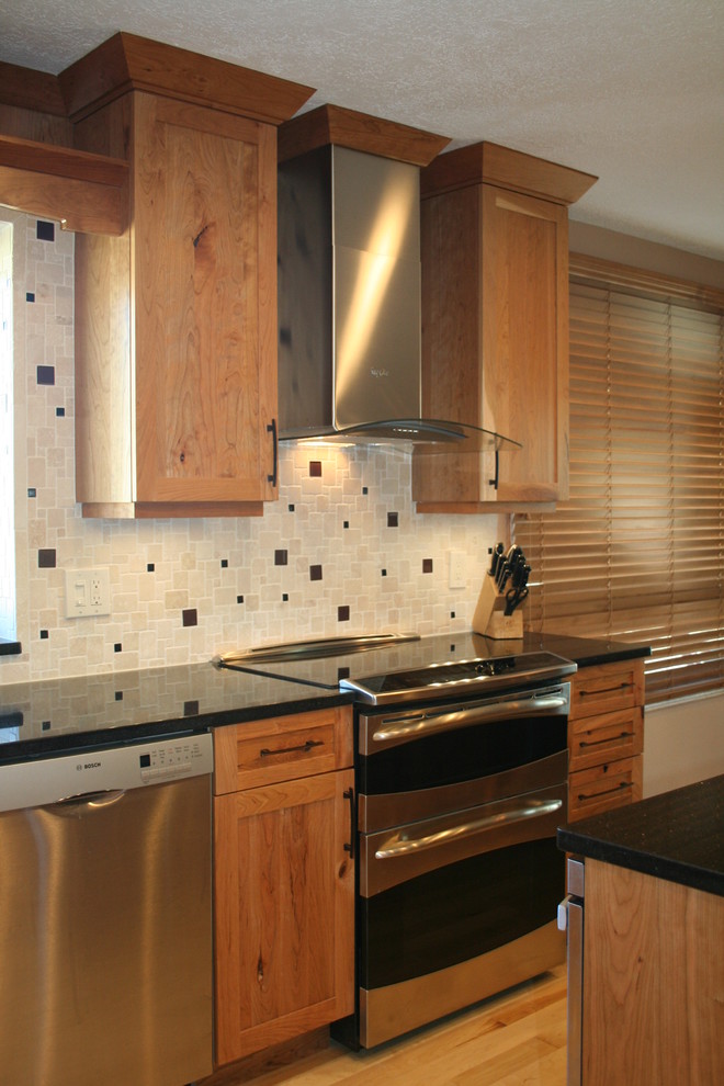 Eat-in kitchen - mid-sized rustic light wood floor and brown floor eat-in kitchen idea in Albuquerque with shaker cabinets, stainless steel appliances, an island, an undermount sink, medium tone wood cabinets, quartz countertops, beige backsplash and ceramic backsplash
