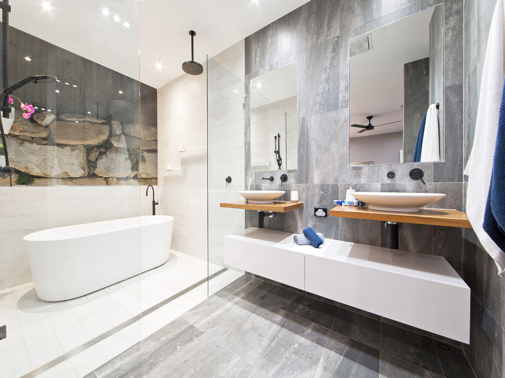 This is an example of a contemporary bathroom in Brisbane with an open shower.