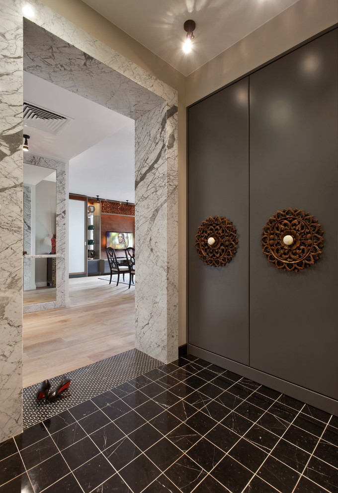 Contemporary entryway in Moscow with beige walls.