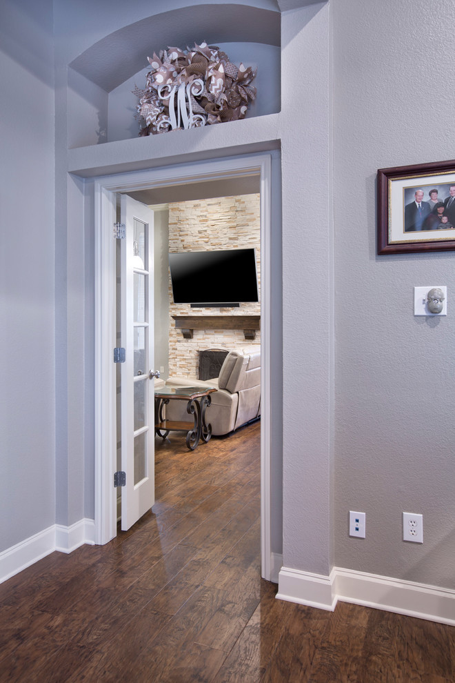 Inspiration for a mid-sized contemporary u-shaped vinyl floor and brown floor kitchen pantry remodel with a double-bowl sink, shaker cabinets, white cabinets, granite countertops, beige backsplash, mosaic tile backsplash, stainless steel appliances and a peninsula