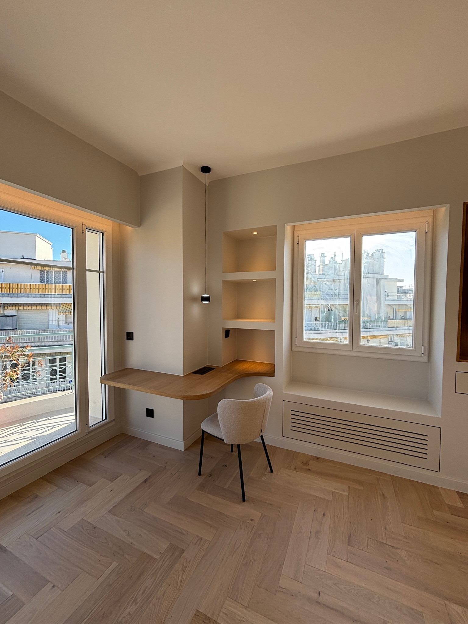 L’union parfaite : deux appartements transformés en un duplex unique