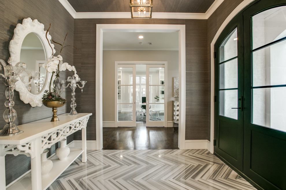 This is an example of a mid-sized transitional foyer in Dallas with grey walls, a double front door and a glass front door.