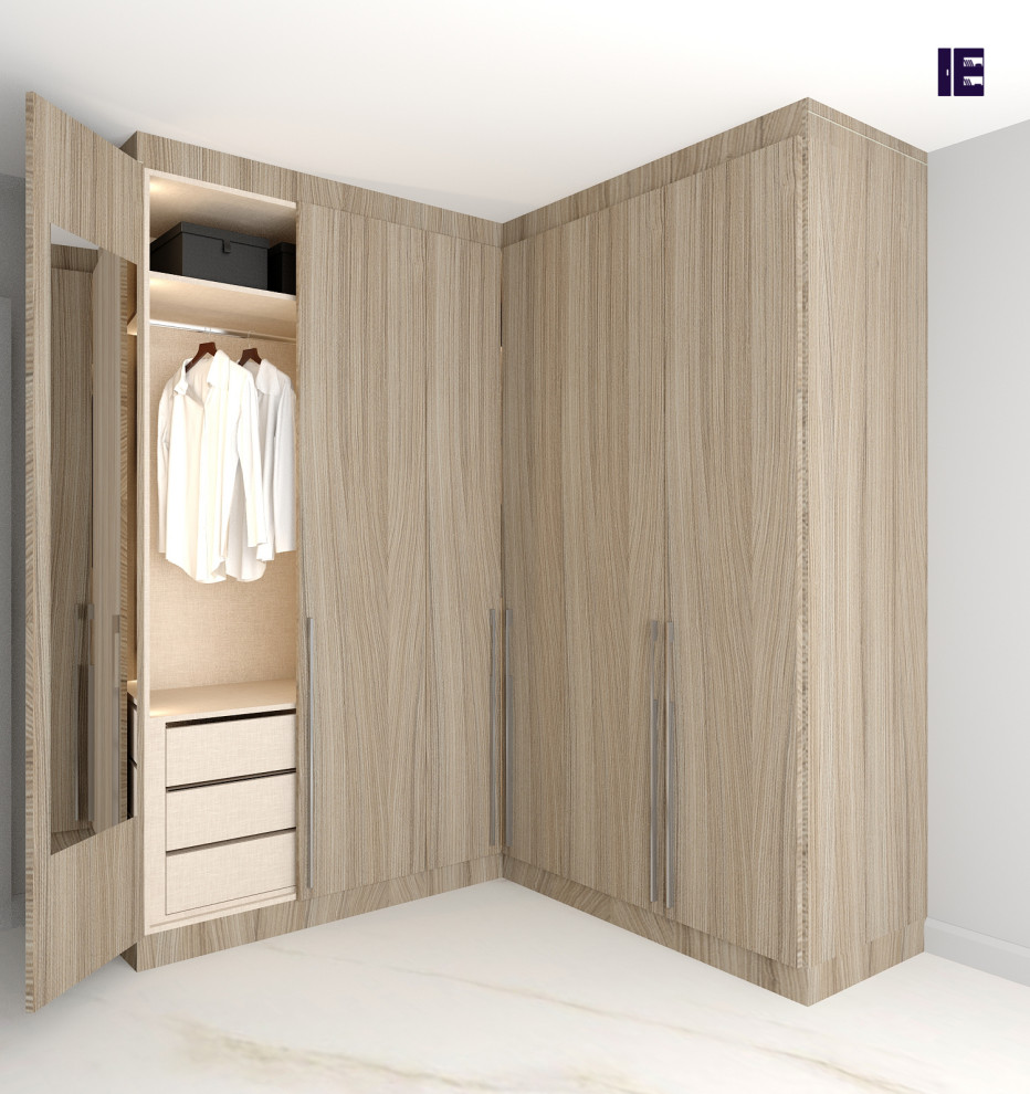 This is an example of a large contemporary standard wardrobe in London with flat-panel cabinets, medium wood cabinets and feature lighting.