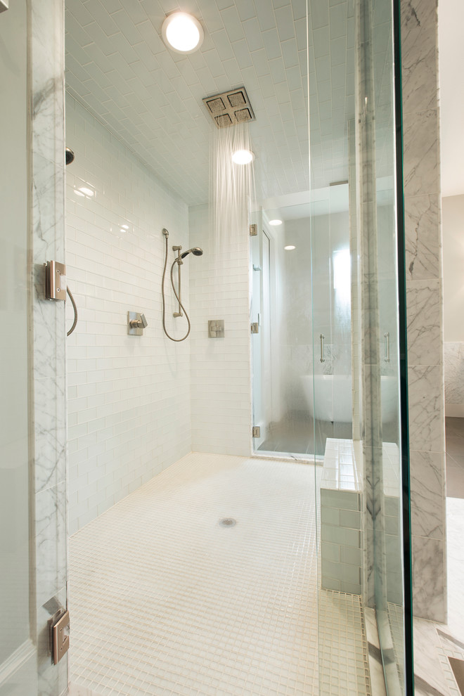Inspiration for a mid-sized transitional master bathroom in Houston with a double shower, white tile, subway tile and porcelain floors.