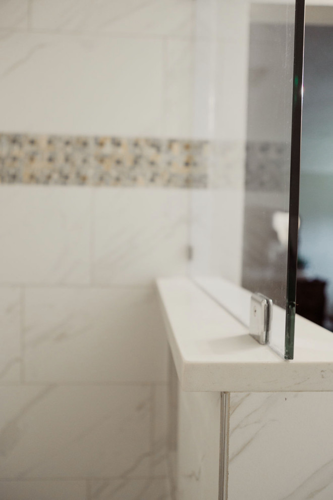 Mid-sized minimalist master white tile porcelain tile and white floor freestanding bathtub photo in Dallas with flat-panel cabinets, brown cabinets, white walls, quartzite countertops, a hinged shower door and white countertops