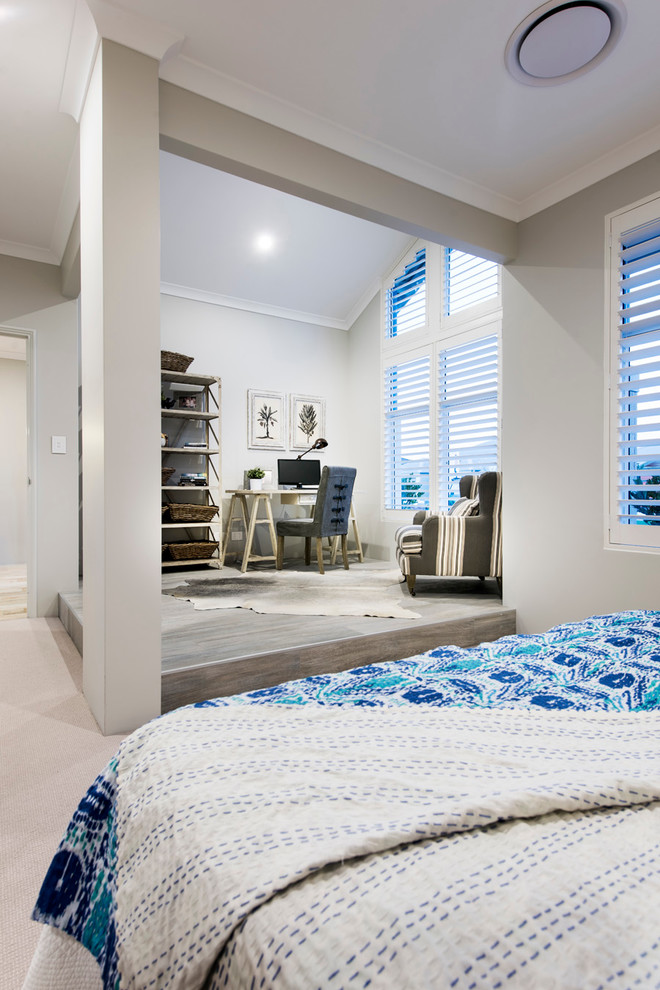 Large beach style master bedroom in Perth with grey walls and carpet.