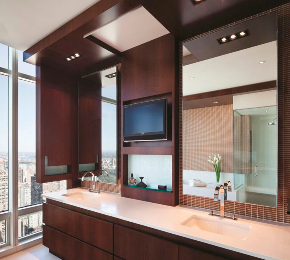 Inspiration for a large contemporary master bathroom in New York with flat-panel cabinets, dark wood cabinets, a drop-in tub, a corner shower, brown tile, mosaic tile, an undermount sink and engineered quartz benchtops.