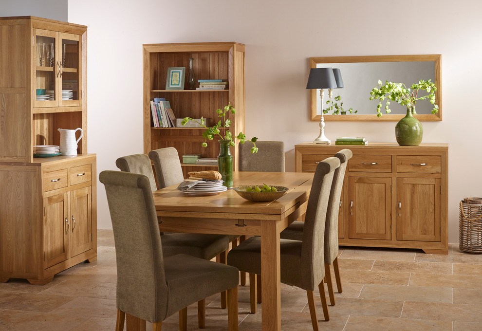 Photo of a transitional dining room in Wiltshire.