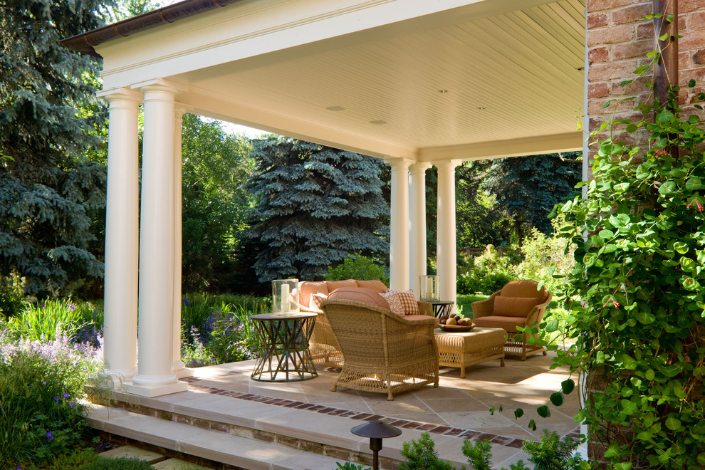 This is an example of a traditional verandah in Denver with a roof extension.