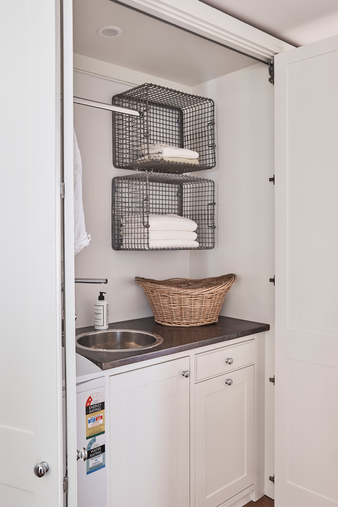 This is an example of a traditional laundry room in Sydney.