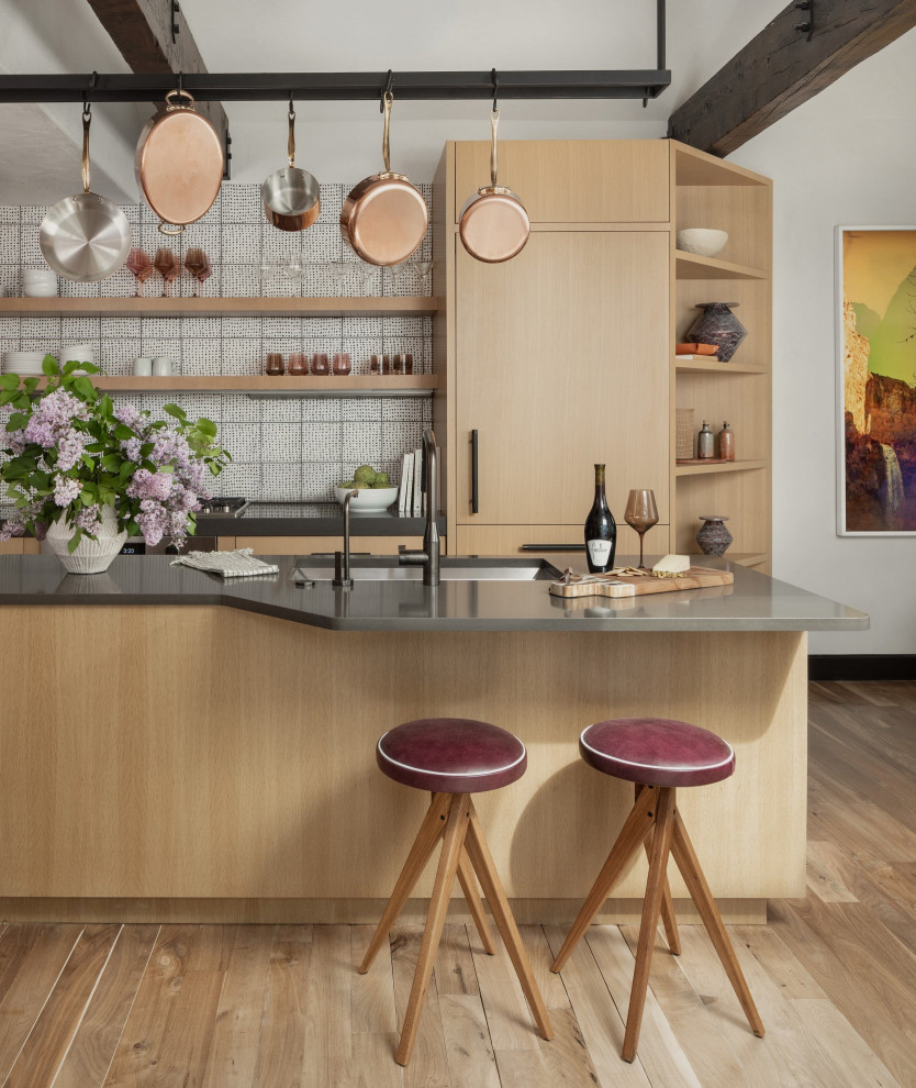 Mid-sized transitional galley medium tone wood floor open concept kitchen photo in Denver with an undermount sink, flat-panel cabinets, light wood cabinets, quartz countertops, stainless steel appliances, an island and gray countertops