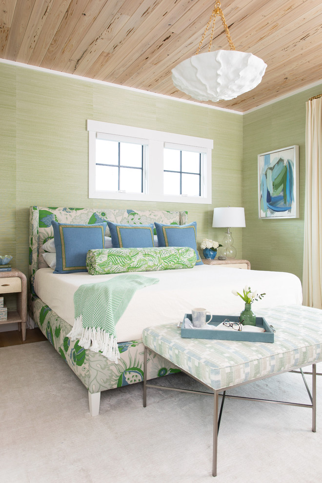Design ideas for a beach style guest bedroom in Other with green walls and no fireplace.