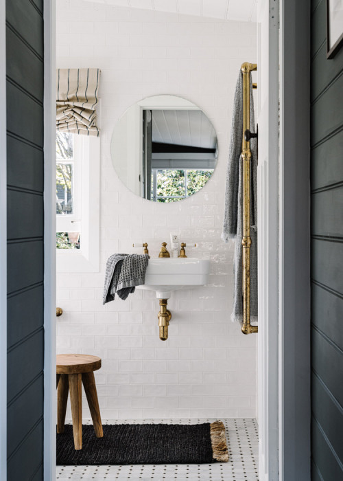 Country Style Farmhouse Bathroom with White Reflective Backsplash