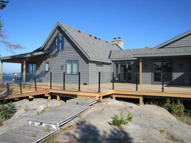 Large waterfront cottage decks coastal-deck