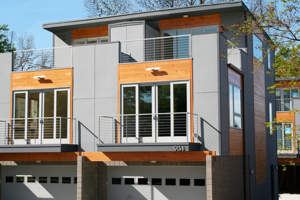 Design ideas for a modern exterior in Charlotte with wood siding.