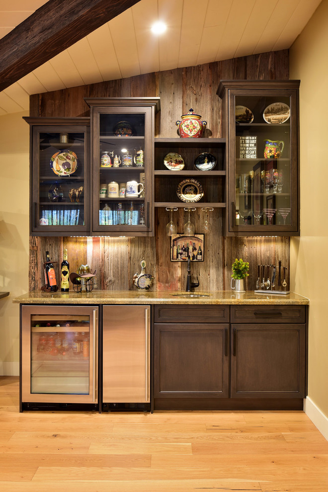 Inspiration for an eclectic home bar in Phoenix.