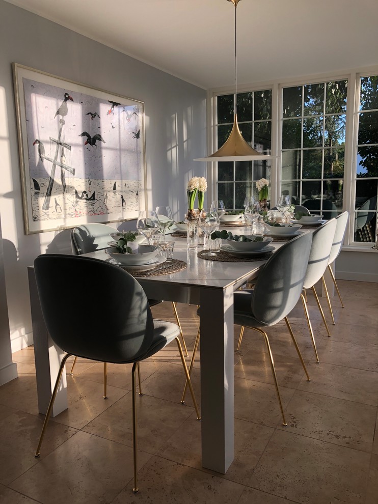 This is an example of a transitional dining room in Copenhagen.