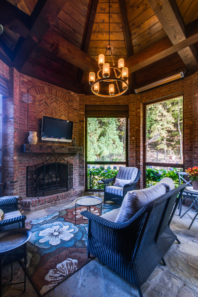 Transitional sunroom in Nashville with a standard fireplace, a brick fireplace surround and a standard ceiling.