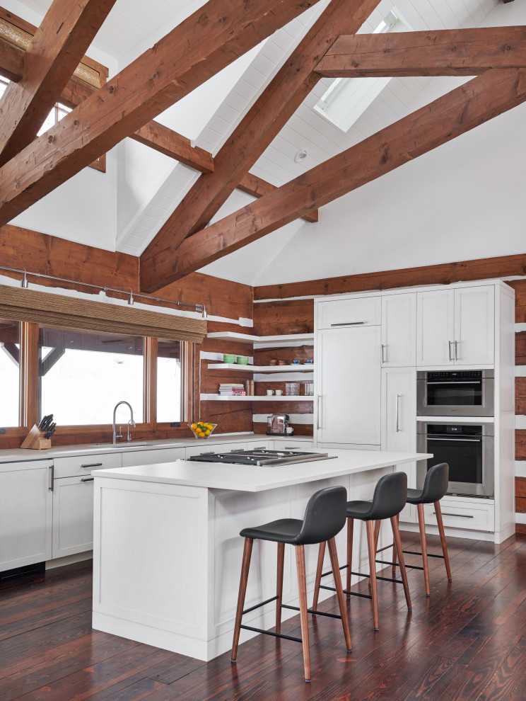 Mountain style open concept kitchen photo in Denver with stainless steel appliances