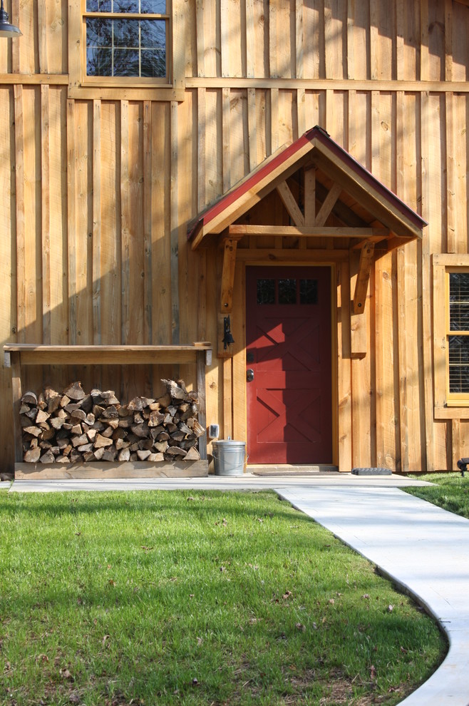 Inspiration for a country entryway in Other with a single front door and a red front door.