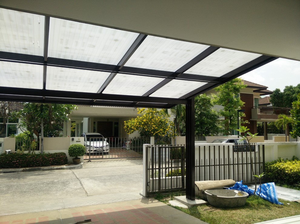 Mid-sized modern attached two-car carport in Other.
