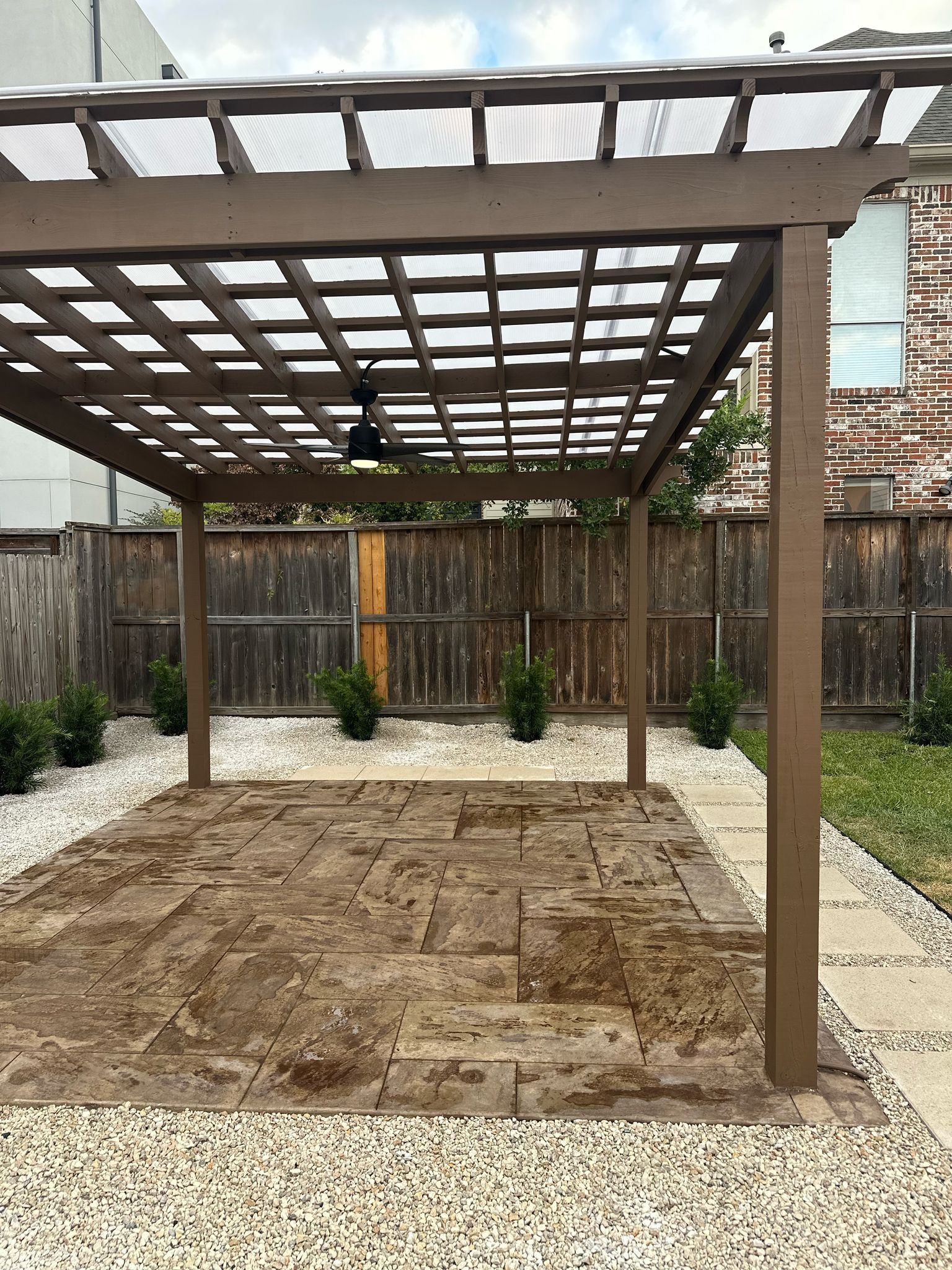 Beautiful stamped concrete patio with Pergola Cover on Haddon st!