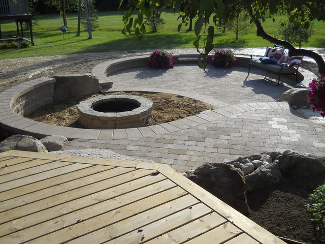 Outdoor Living Space With Walkout Basement Addition Rustic